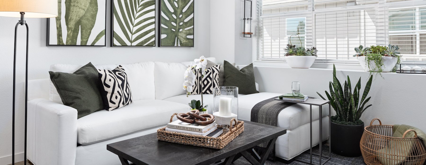 a living room with a couch and coffee table